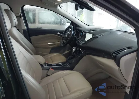 2015 Ford Escape Titanium z USA, uszkodzony, nr VIN 1FMCU0J93FUC55513